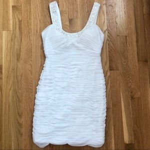 Brides! Beautiful beaded white dress.